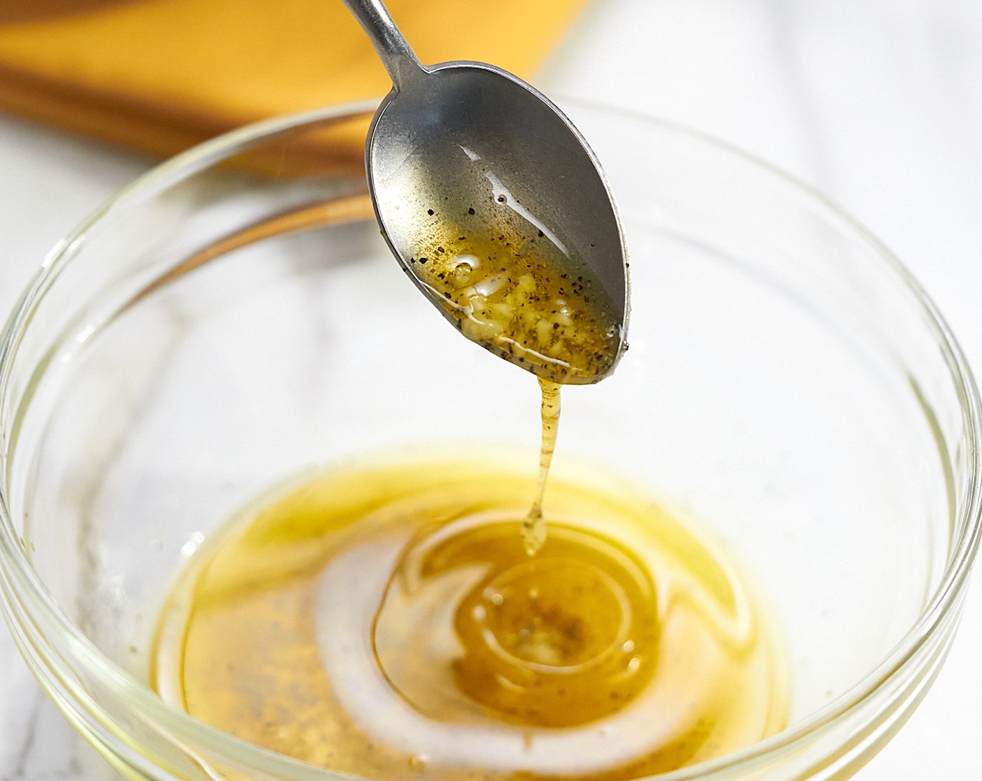 step 4 In a small bowl, combine the Olive Oil (2 Tbsp), Butter (3 Tbsp), Garlic (2 cloves), Salt (1 tsp), and Ground Black Pepper (1/2 tsp).