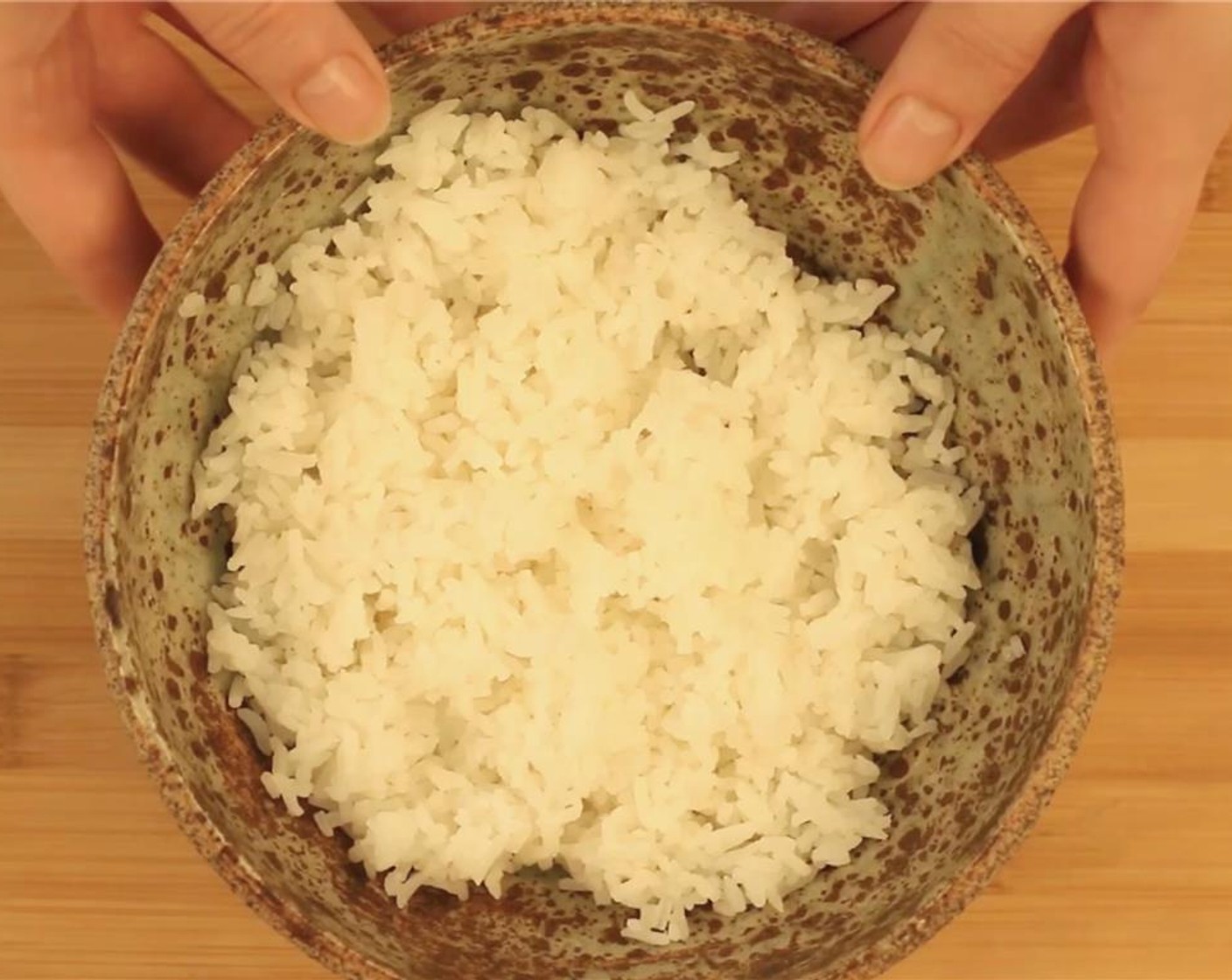 step 4 Divide the cooked White Rice (2 2/3 Tbsp) between two bowls.