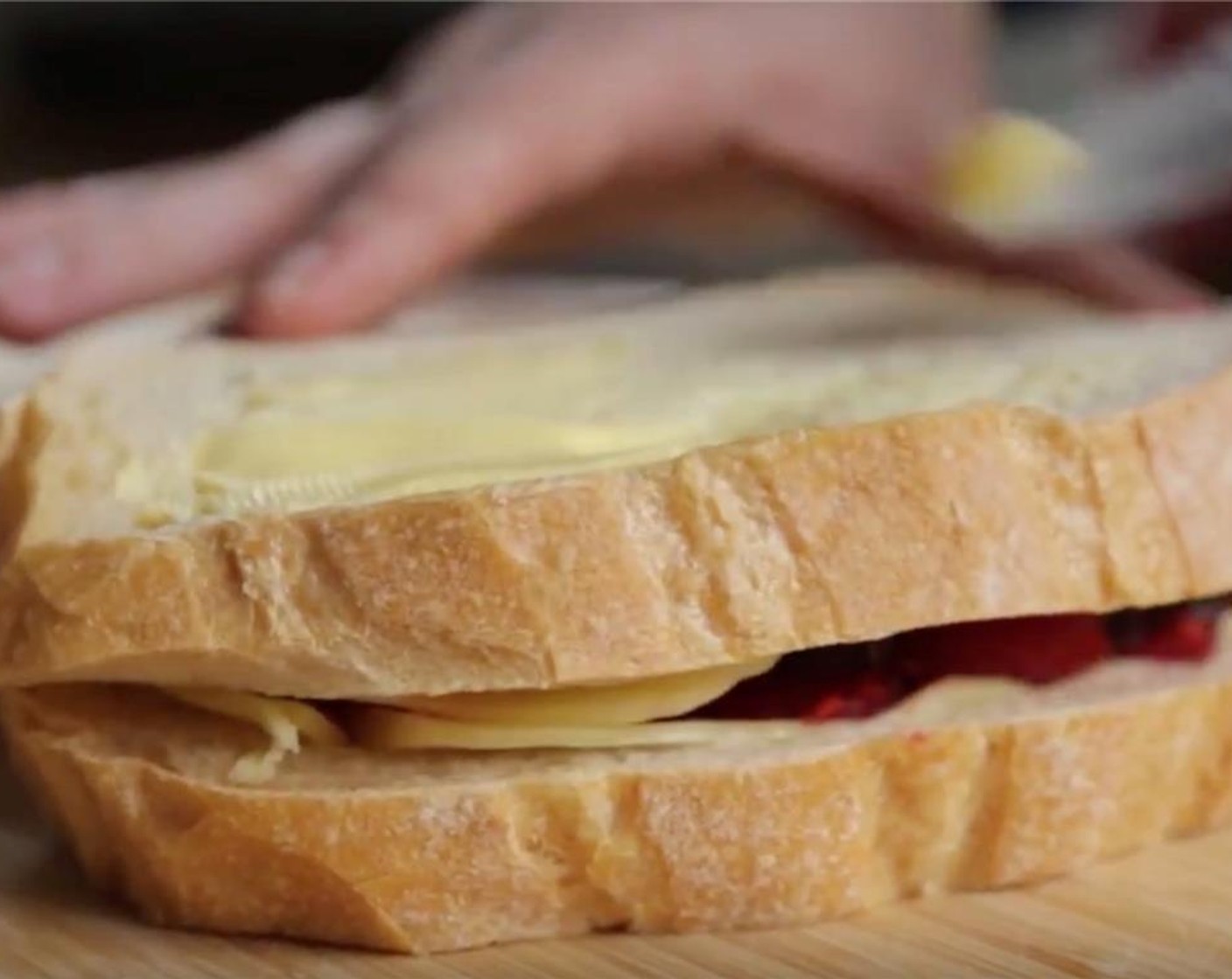 step 7 Place second slice of bread on top and spread with Unsalted Butter (1 tsp)