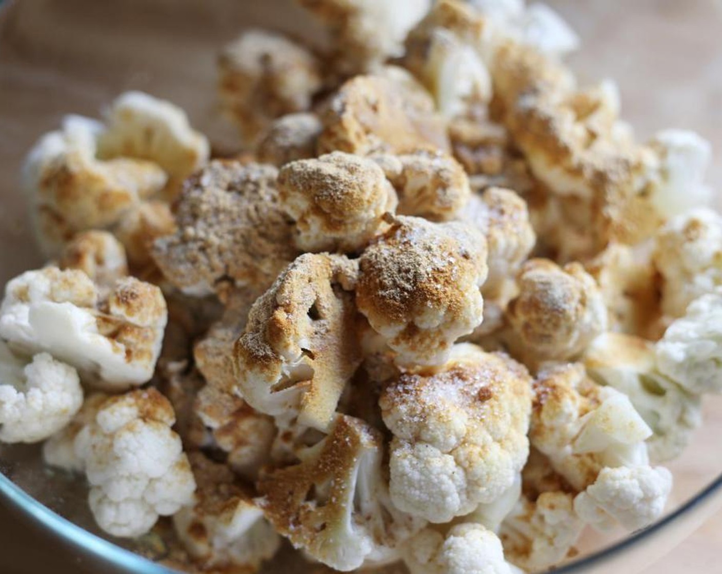 step 2 In a medium bowl, combine the cauliflower florets, Rice Wine (2 Tbsp), Ground Ginger (1 1/3 Tbsp), Salt (1 tsp), and Ground White Pepper (1/2 tsp).