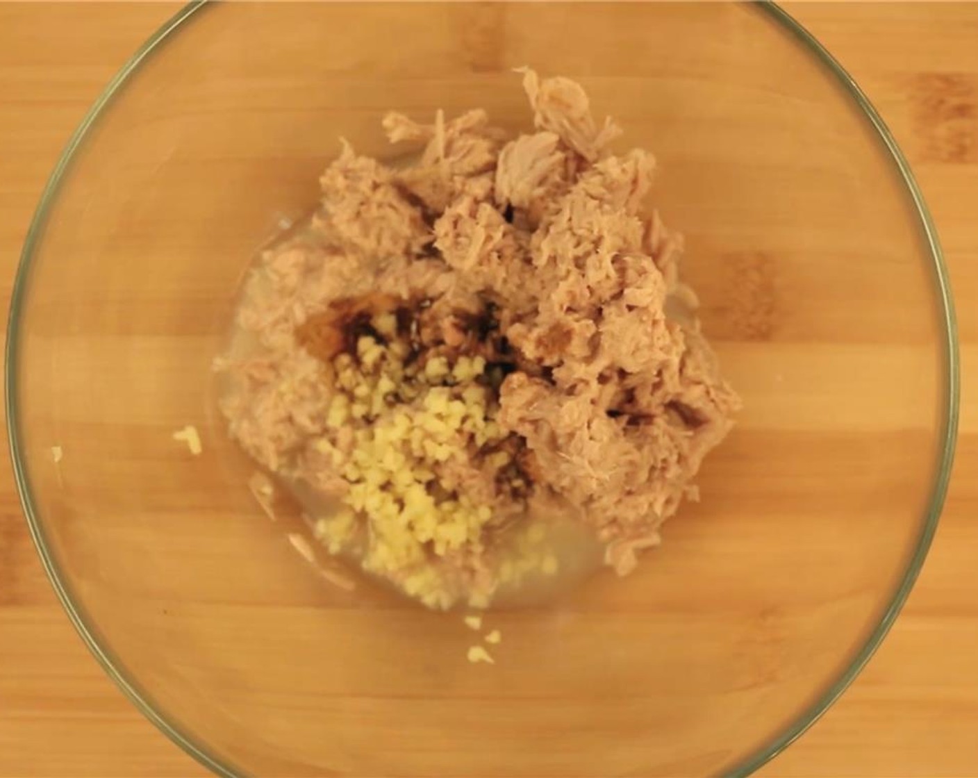 step 2 Add Fresh Ginger (1 in) it to the bowl along with the Low-Sodium Soy Sauce (2 tsp) and Sesame Oil (1 tsp).
