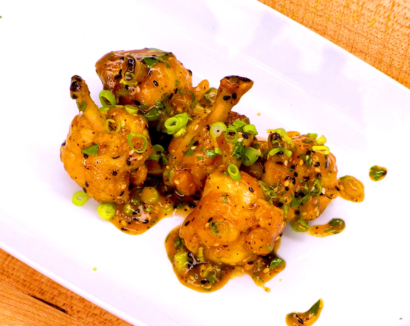 Crispy Chicken Wing Lollipops with Lemon Pepper Sauce