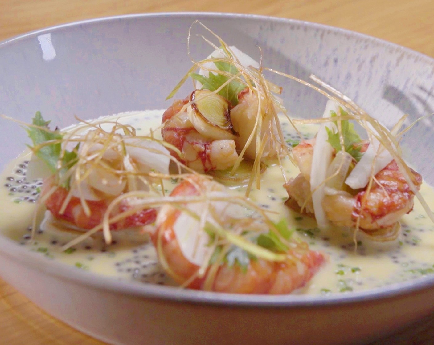 Butter Poached Red Shrimp with Ouzo Butter and Crispy Leaks