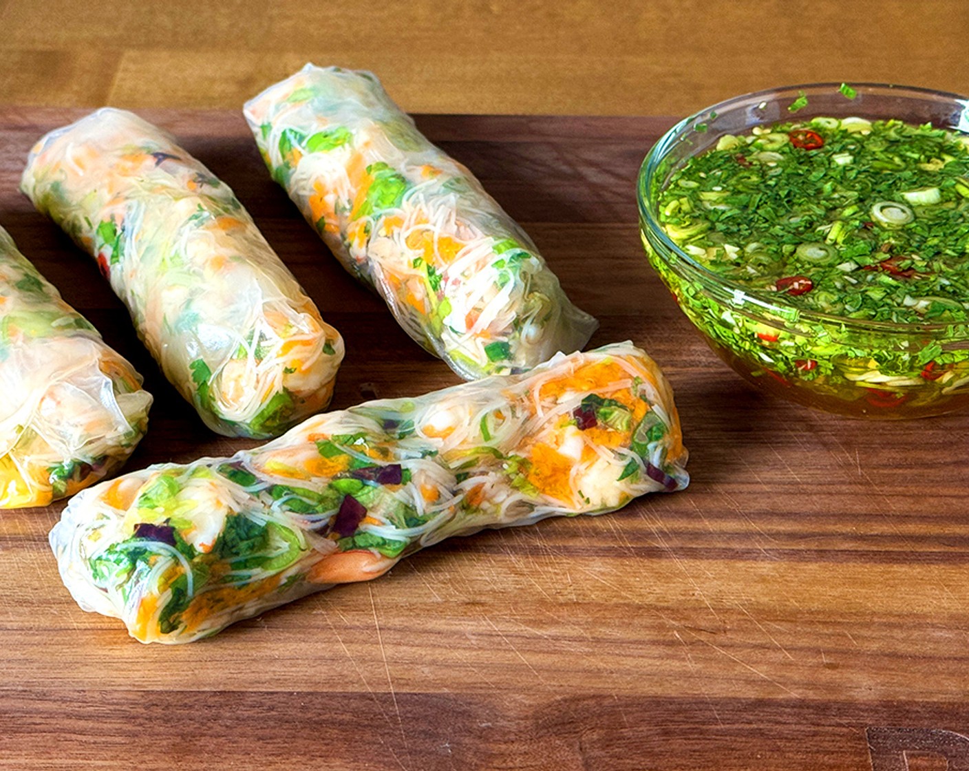 step 4 Serve the rolls with the remaining sauce for dipping.