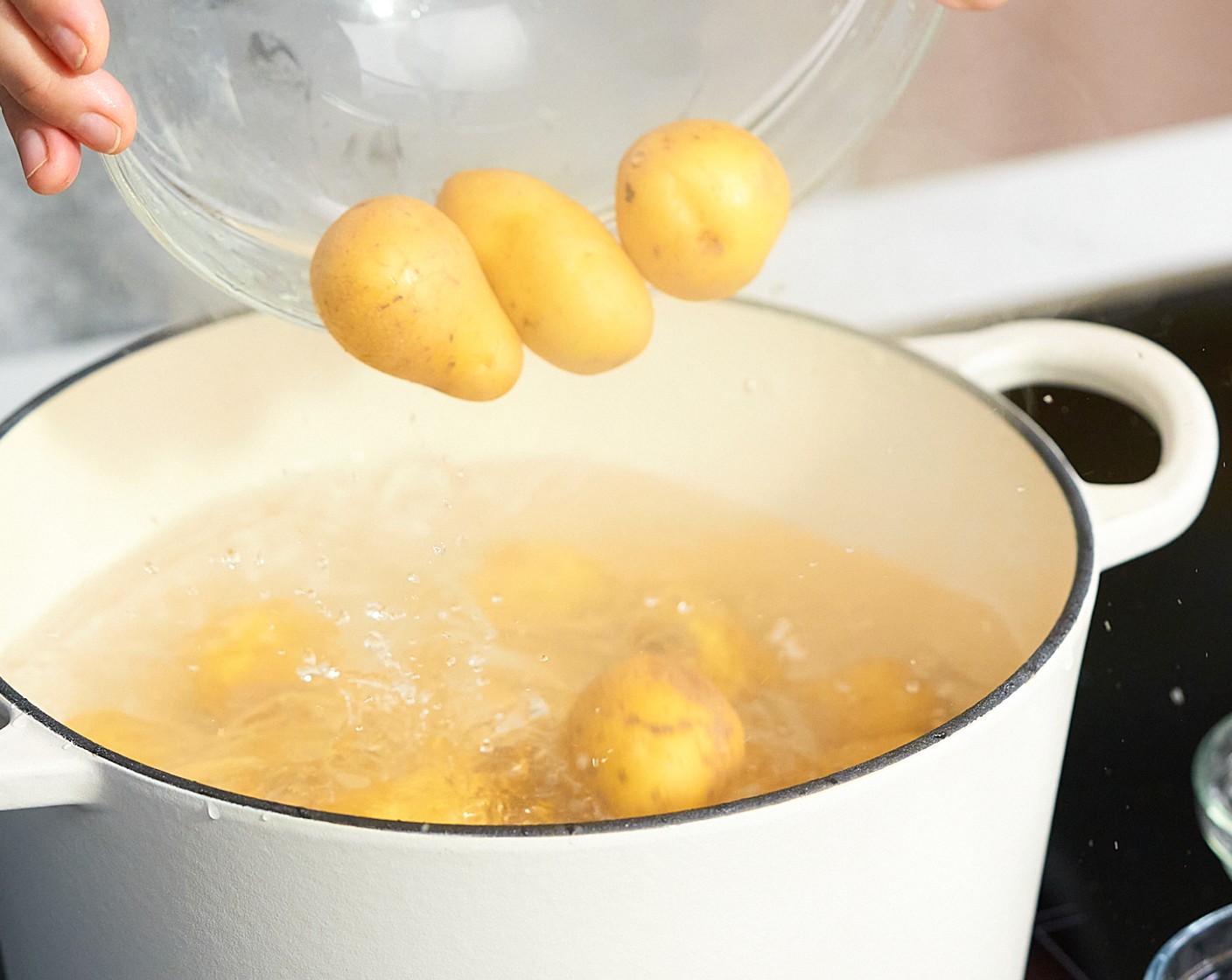 step 2 Bring a pot of water to a boil large enough to fit the potatoes. Once boiling, add Baking Soda (2 tsp), Salt (1 tsp), and Potatoes (6 cups). Cook the potatoes until tender for 10-15 minutes.
