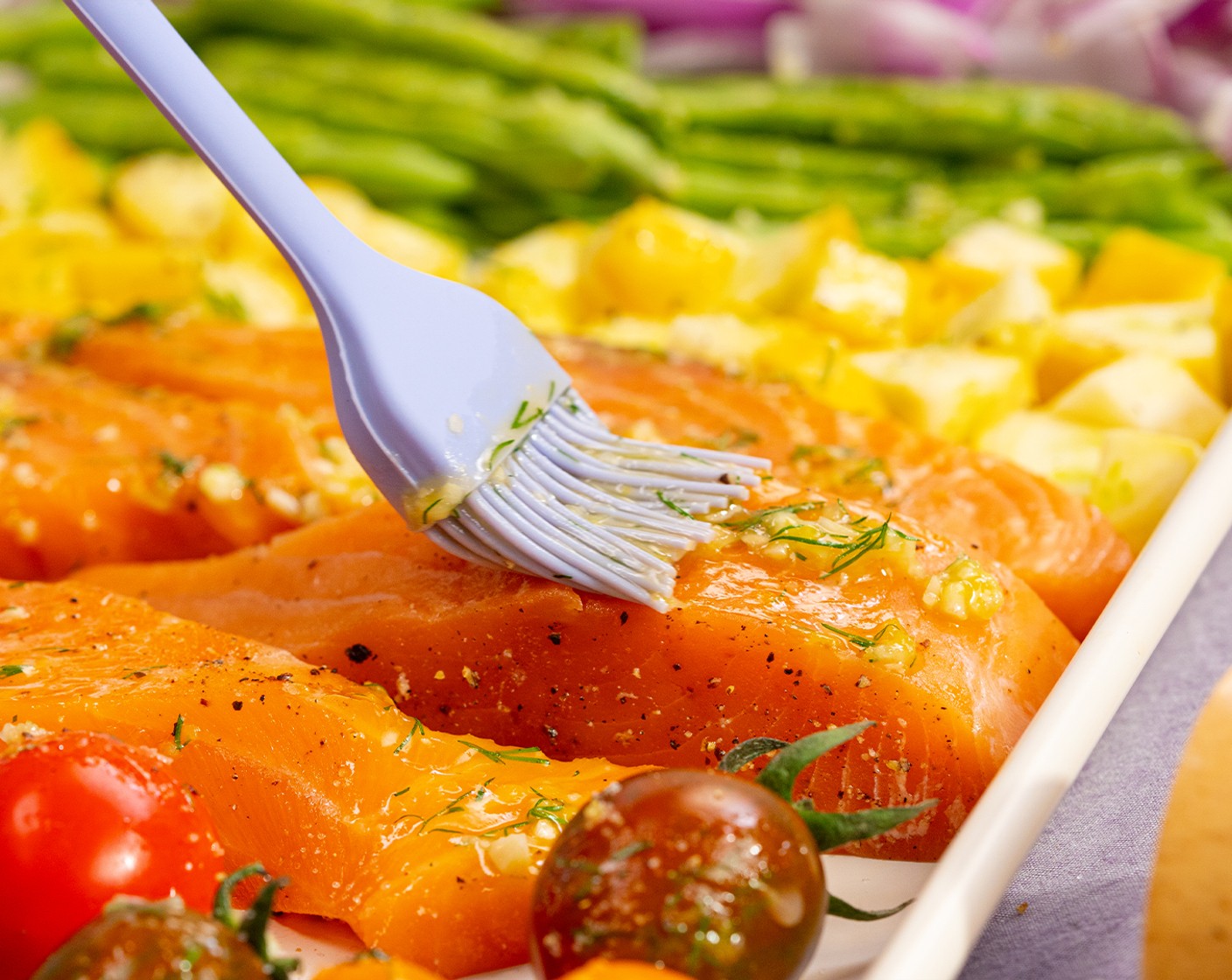 step 6 Brush the lemon-dill mixture on salmon and vegetables. Sprinkle Salt (1/2 tsp) and Pepper (1/8 tsp) on top of the vegetables. Bake for 10-15 minutes, depending on the thickness of the salmon.