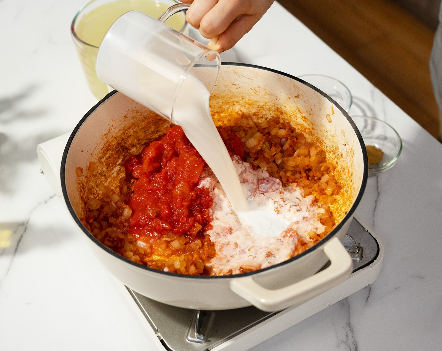 step 4 Add Diced Tomatoes (1 can), Milk (1/2 cup), Chicken Broth (4 cups), Dijon Mustard (2 tsp), and Worcestershire Sauce (1 tsp). Stir to pull up everything from the bottom. Bring to a boil and then lower to a simmer and cook for 10 minutes.