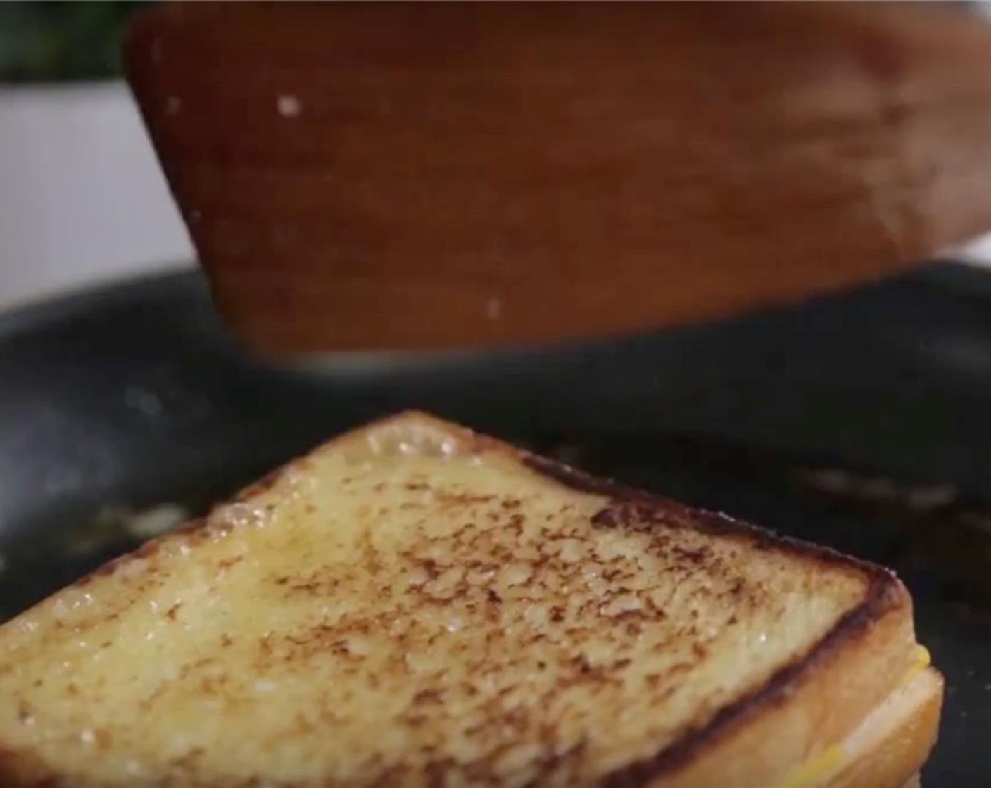 step 5 When underside is golden brown, about 4 minutes, turn sandwich and add remaining Unsalted Butter (1 tsp) to skillet. Press down on sandwich to encourage even browning and to help melt cheese. Cook until second side is golden brown and cheese is melted.