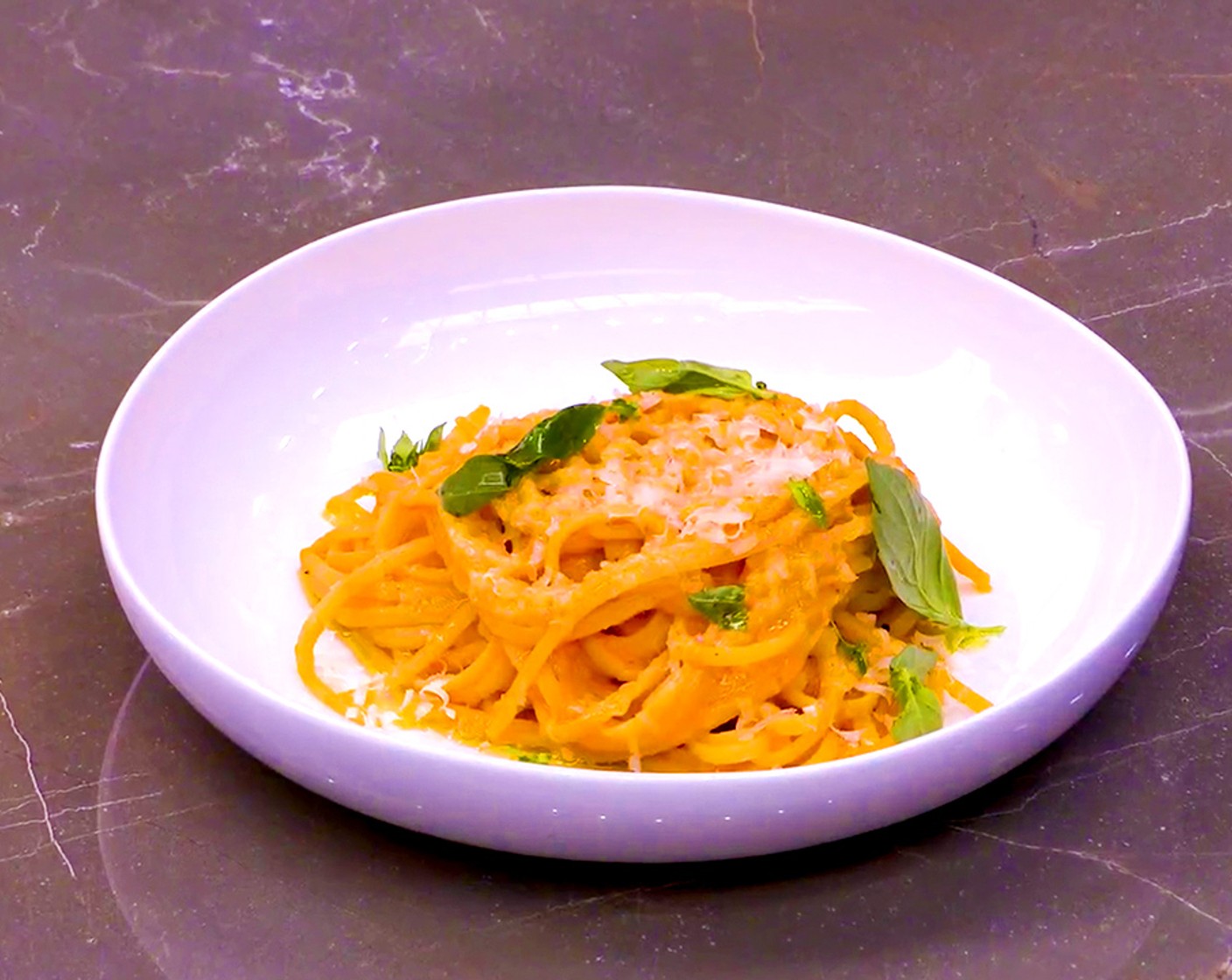 step 14 Serve your pasta with freshly grated Parmesan Cheese (to taste), whole basil leaves, and a drizzle of olive oil.