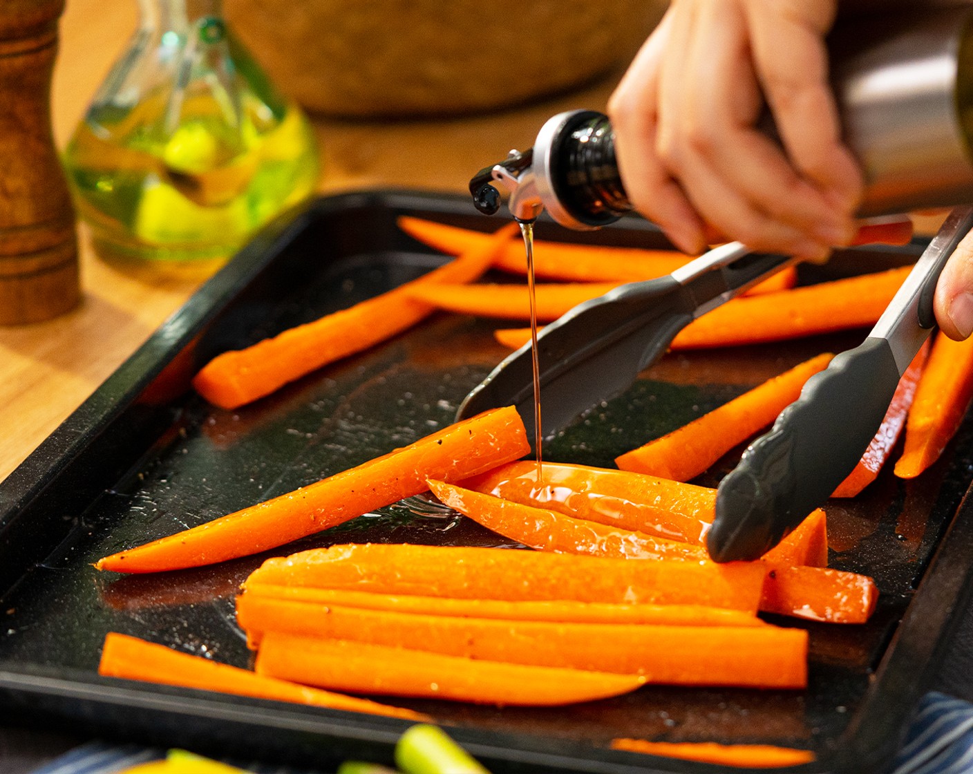 step 2 On a baking tray, toss Carrots (3 cups) with Olive Oil (2 Tbsp), Fine Salt (1/2 tsp), and Pepper (1/2 tsp). Roast in the oven for 10-15 minutes.