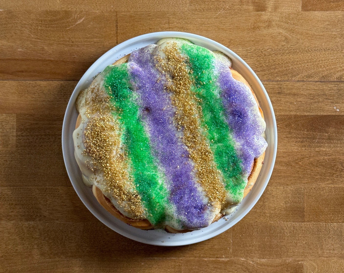 step 15 Let cool for about 15 minutes then evenly frost with frosting and sprinkle with Colored Sugar Crystals (to taste).