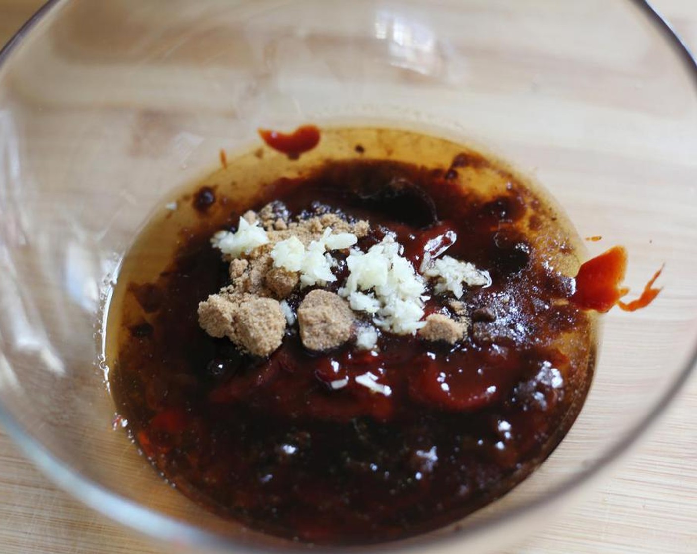 step 4 To make the sauce, combine Chung Jung One® Gochujang Spicy Ketchup (3/4 cup), Honey (4 Tbsp), Dark Brown Sugar (4 Tbsp), Gluten-Free Soy Sauce (2 Tbsp), Sesame Oil (1 1/3 Tbsp), and Garlic (1 tsp).