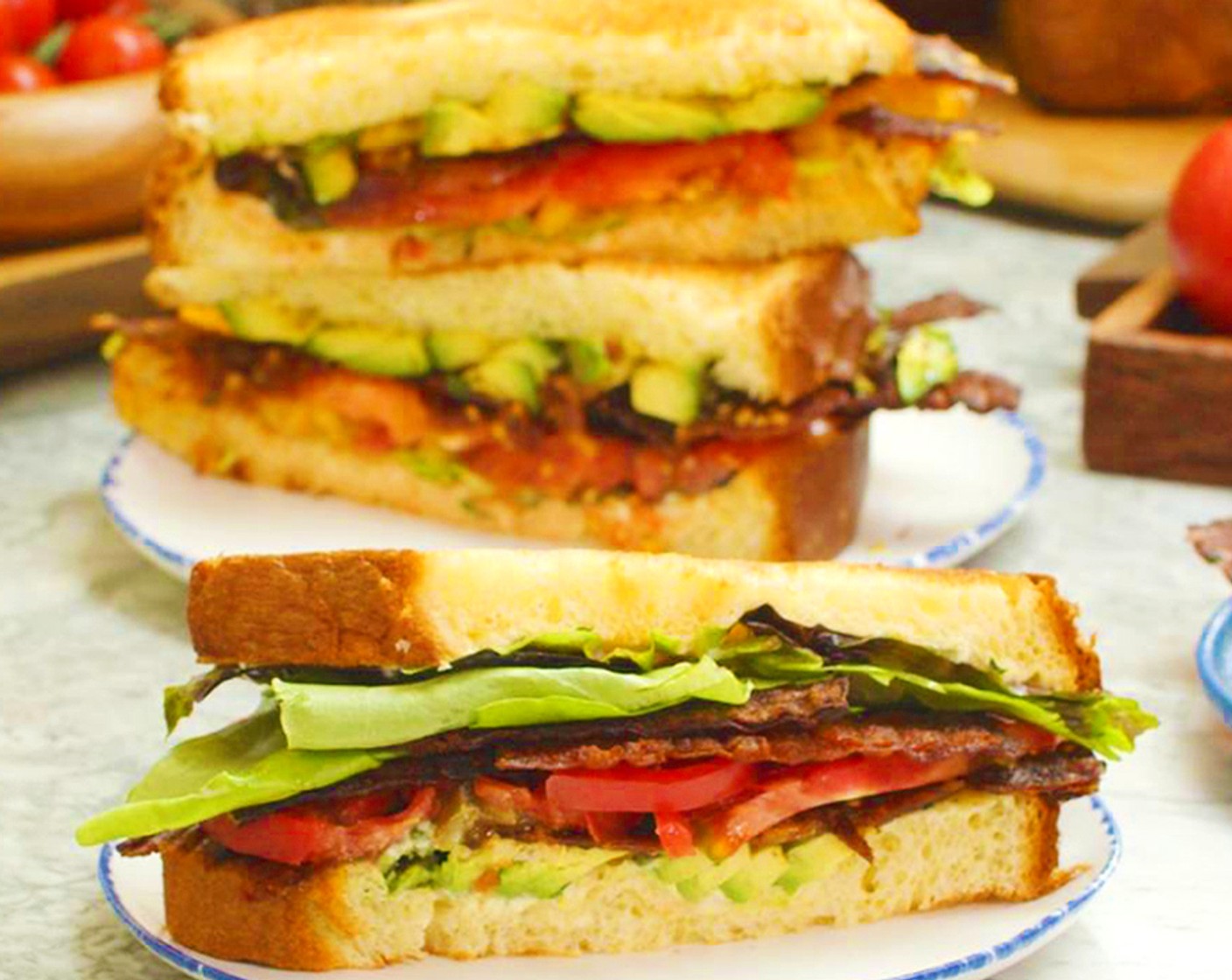 step 10 To build - slather toasted bread with aioli, Butter Lettuce (1 head) seasoned tomato, crispy bacon strips, and top with Avocado (1) slices. Serve alongside crunchy potato chips for the perfect summer lunch any time of day.