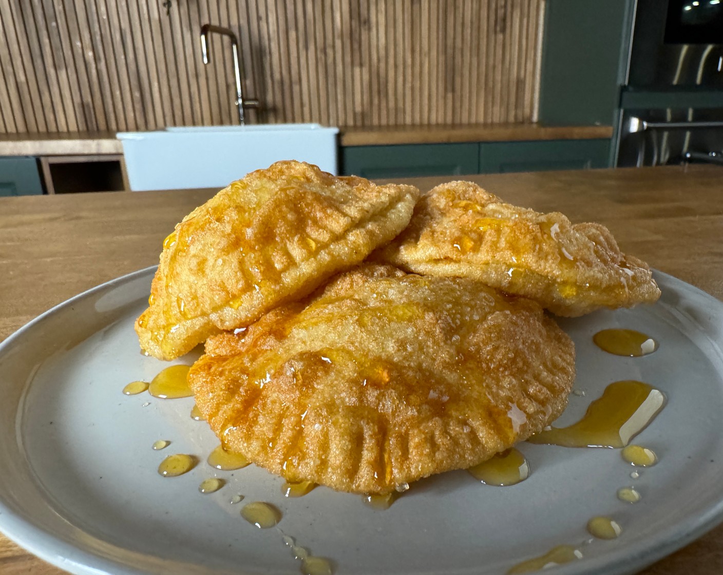 step 5 Drizzle with Honey (1/2 cup) and sprinkle with additional lemon zest before serving.