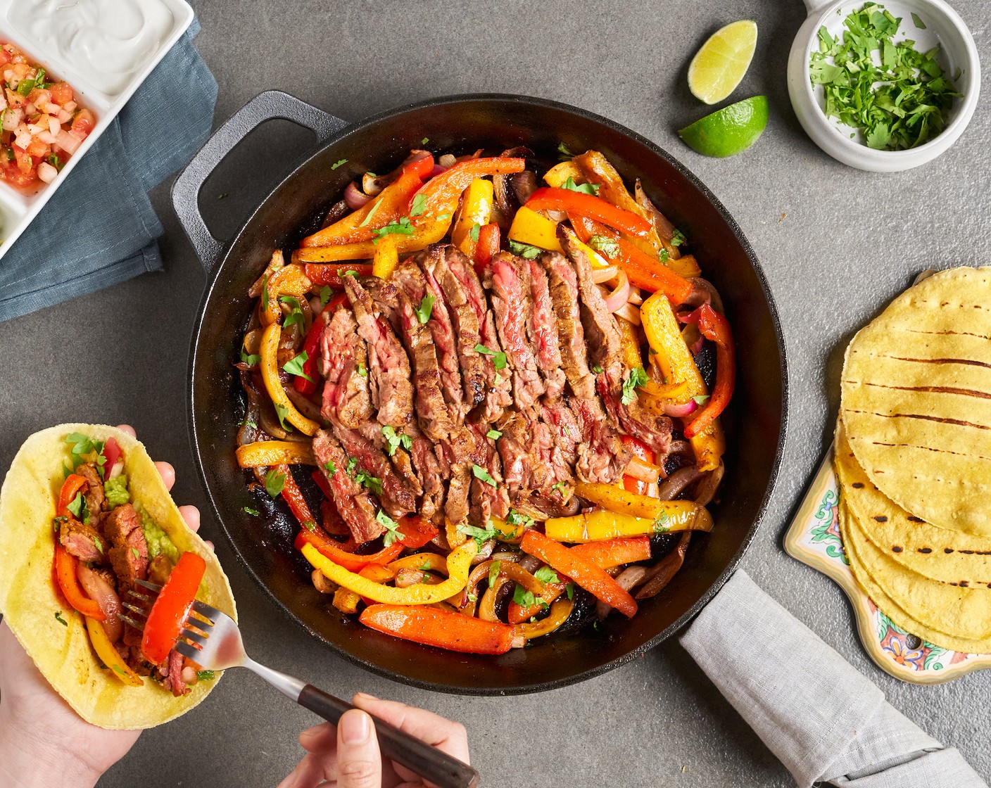 step 8 Garnish with Fresh Cilantro (1/4 bunch). Serve hot along with Small Corn Tortillas (12), Guacamole (1 cup), Pico de Gallo (1 cup), Sour Cream (1 cup), and Lime Wedges (1) on the side.