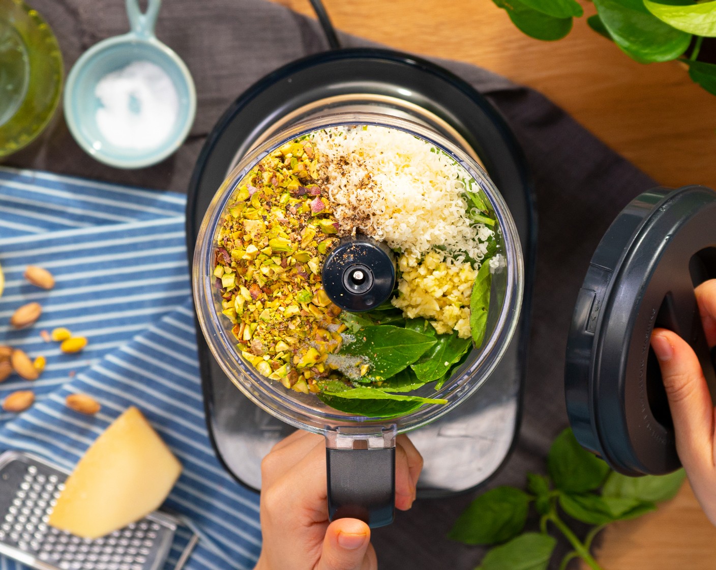 step 4 Pulse Fresh Basil Leaves (2 cups), Cheese (1/3 cup), Roasted Salted Pistachios (1/2 cup), Garlic (1 clove), Salt (1/2 tsp), and Pepper (1/2 tsp) in a food processor until finely chopped.
