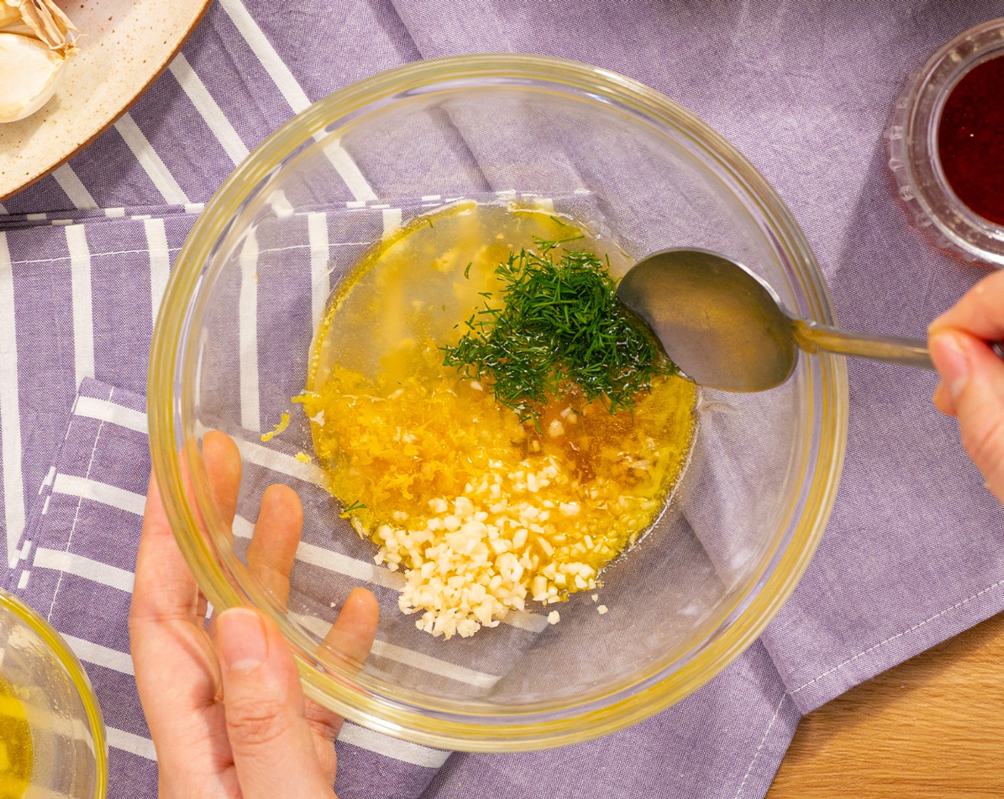 step 4 In a small mixing bowl, combine Butter (2 Tbsp), 1 1/2 Tbsp of Lemon Juice (1), Honey (1 tsp), Garlic (2 cloves), 1/2 Tbsp of Lemon Zest, and Fresh Dill (1 Tbsp) together.