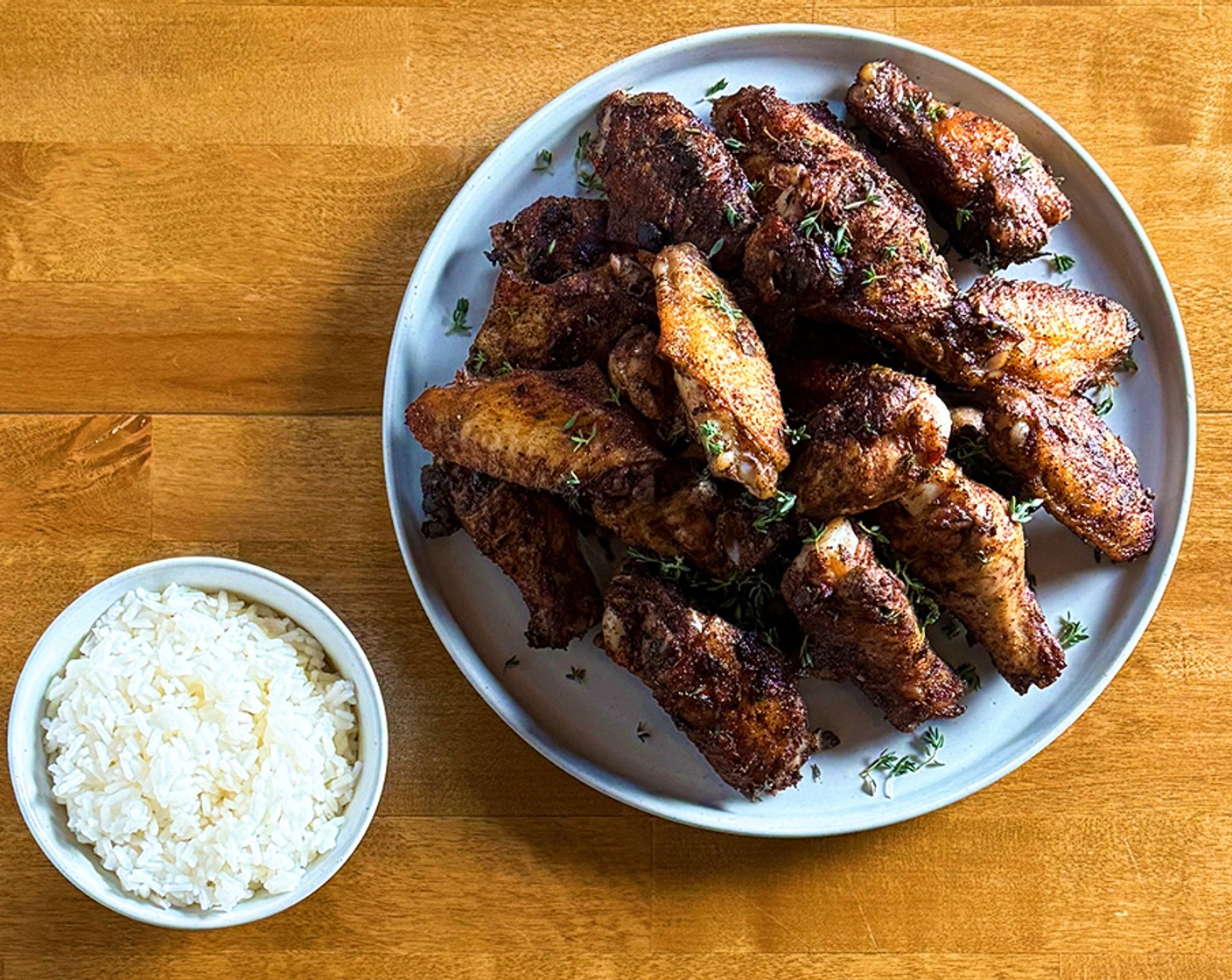 step 4 Place a large skillet over medium heat. Add the Olive Oil (2 Tbsp) and cook the chicken wings until crisp on both sides. Add the Worcestershire Sauce (2 Tbsp) to the skillet and toss to coat completely then place the wings in a single layer on an aluminum lined baking sheet and roast until cooked to an internal temperature of 165℉. Garnish with Fresh Thyme (to taste).