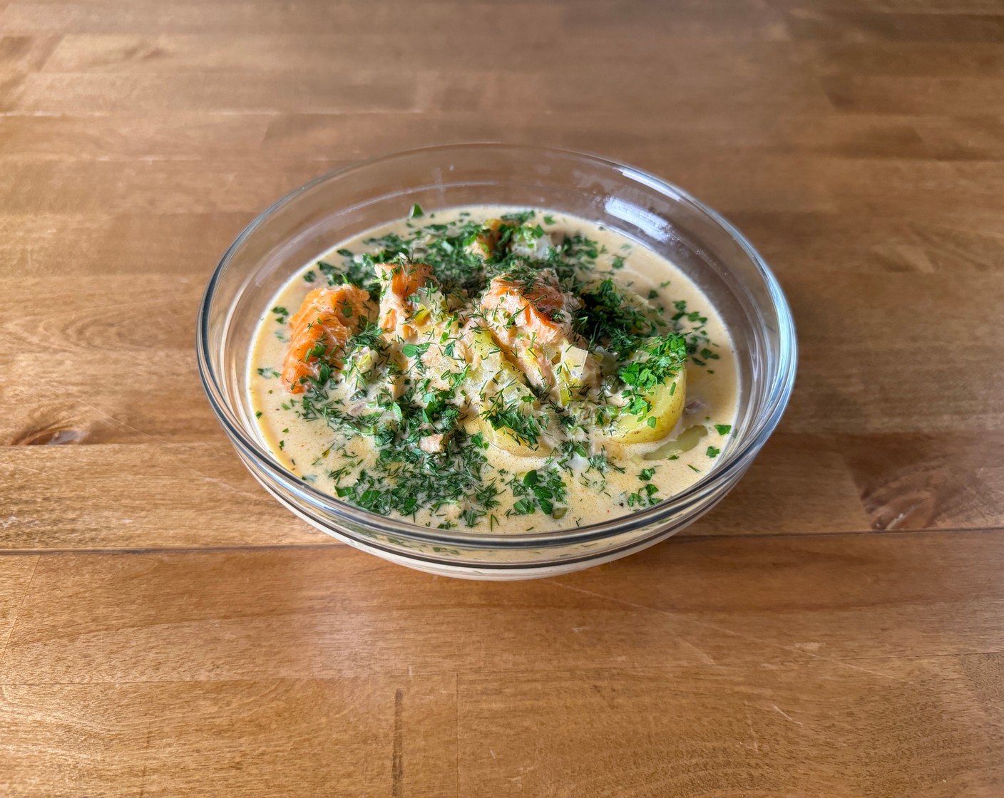 step 5 Adjust and Serve: Taste and adjust seasoning with Salt (to taste) and Ground Black Pepper (to taste). Garnish with Fresh Parsley (to taste) or dill, and a little more smoked salmon, if desired. Serve warm with crusty bread or oyster crackers.